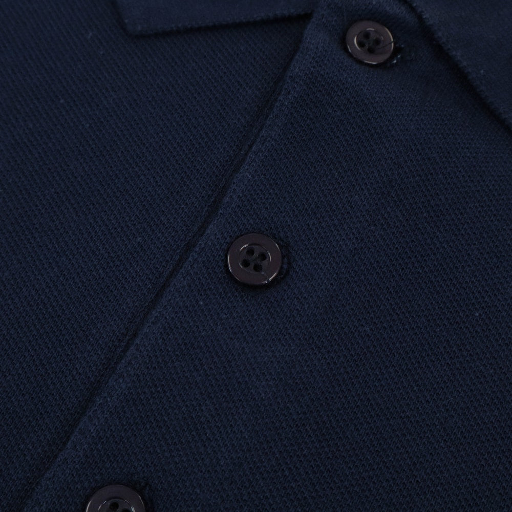 Navy blue plain cotton polo shirt with ribbed collar and short sleeves