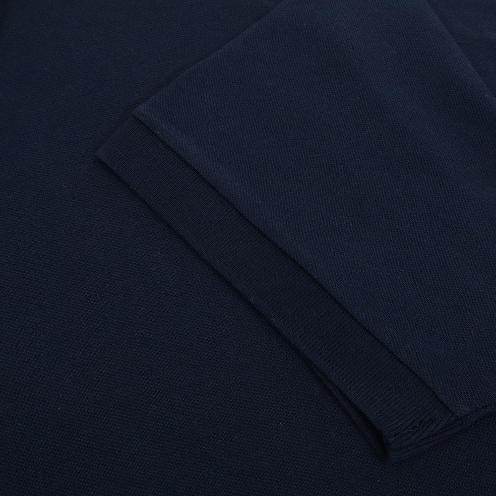 Navy blue plain cotton polo shirt with ribbed collar and short sleeves