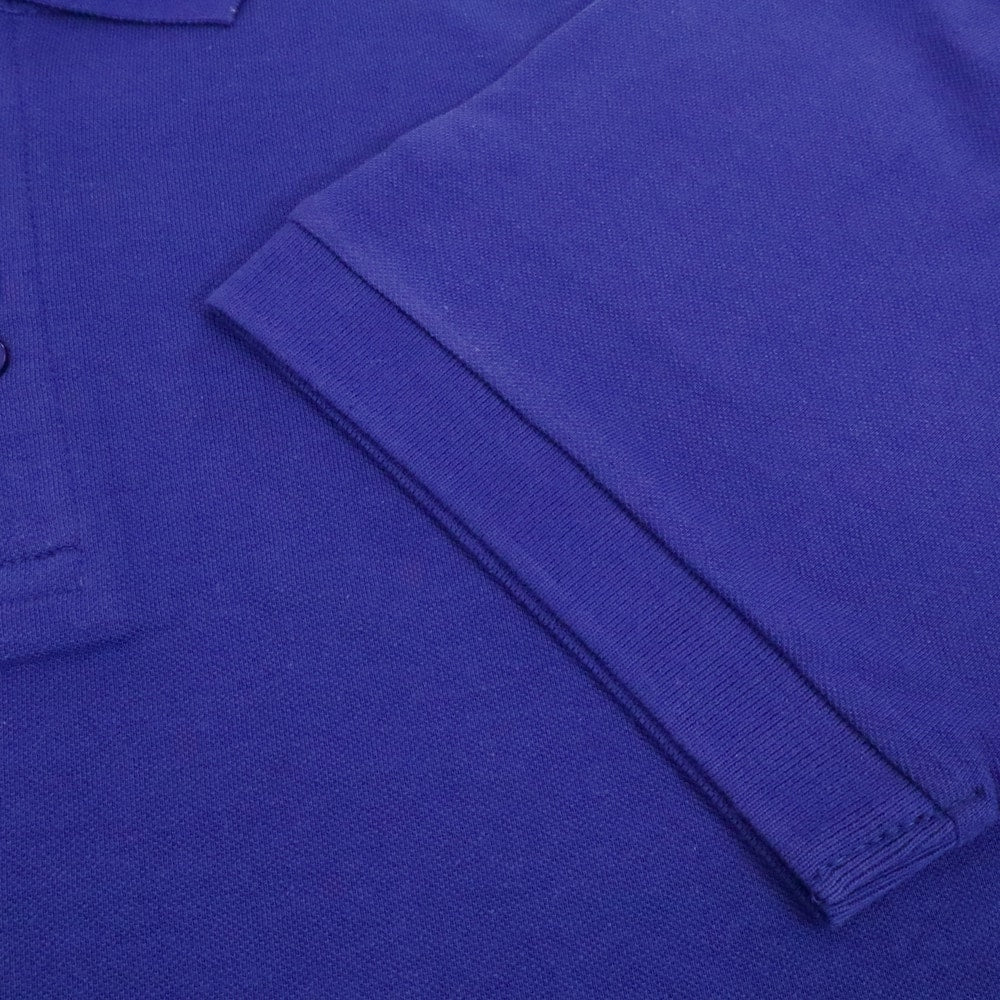 Cobalt blue plain polo shirt with ribbed collar and three button placket